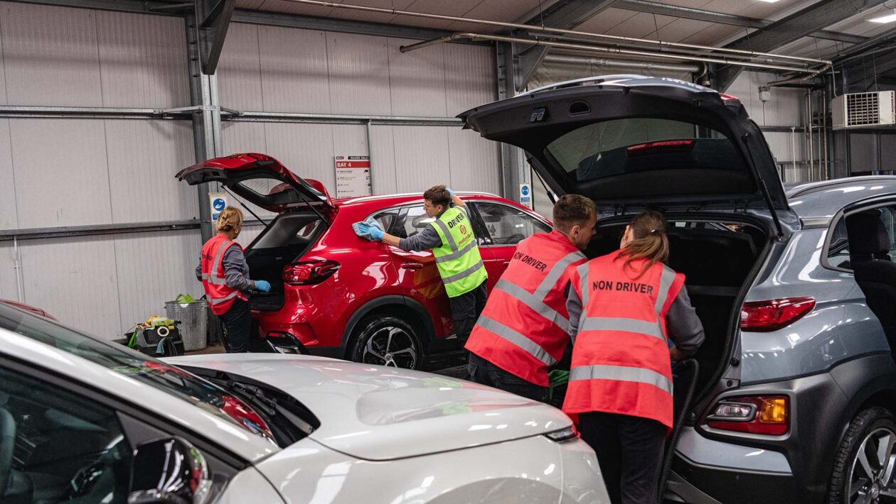 Motorclean technicians preparing vehicles        